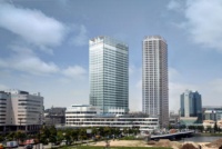 横浜ダイヤビルディングの完成予想（中央）。右側の建物はナビューレ横浜タワーレジデンス、手前が横浜ベイクォーター（資料：三菱倉庫）
